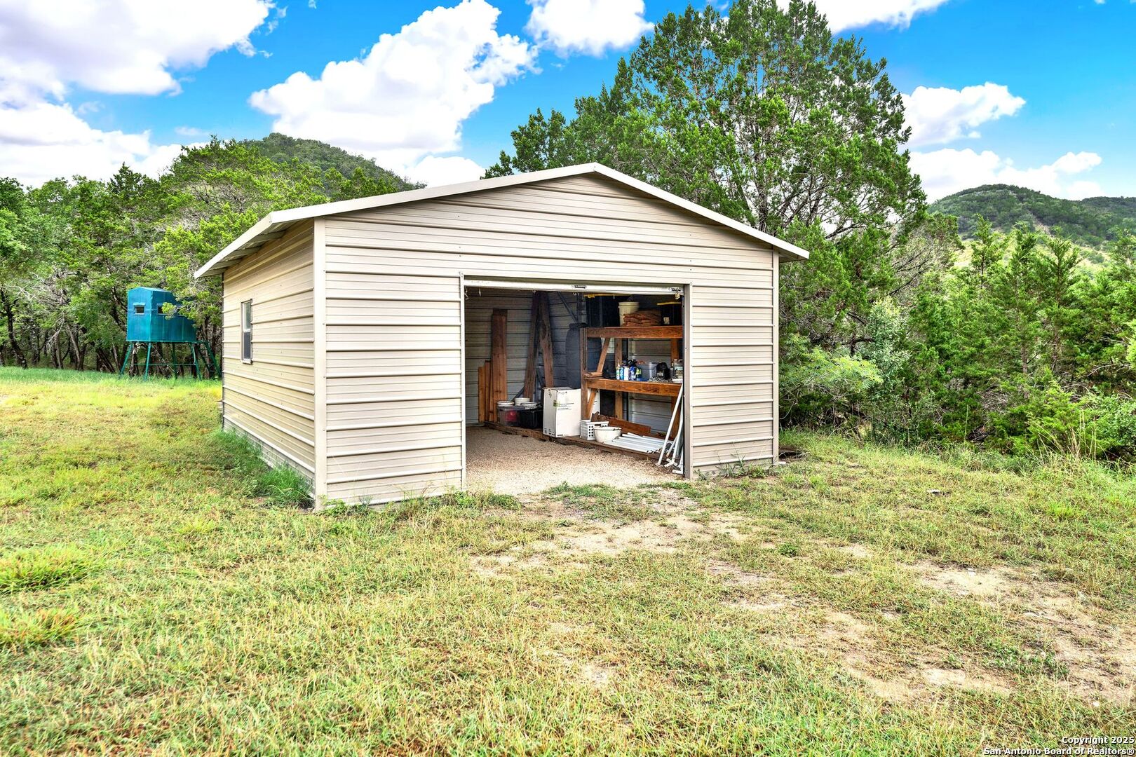 3695 Rio Hondo Road Tarpley, TX 78883 - Photo 41 of 47 a view of a house with a yard