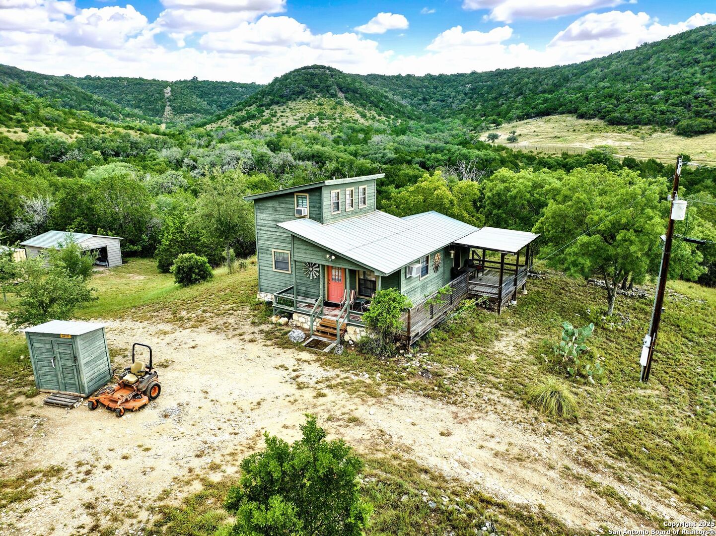 3695 Rio Hondo Road Tarpley, TX 78883 - Photo 6 of 47 a view of a house with a yard
