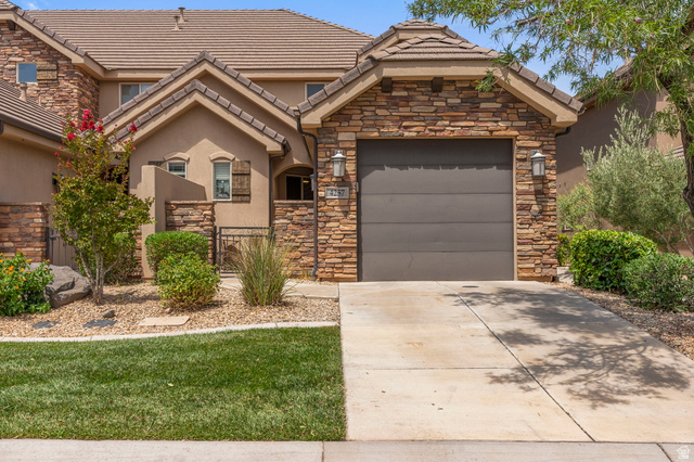4257 Razor Drive Washington, UT 84780 - Photo 53 of 58 Stone veneer and stucco exterior with a tile roof