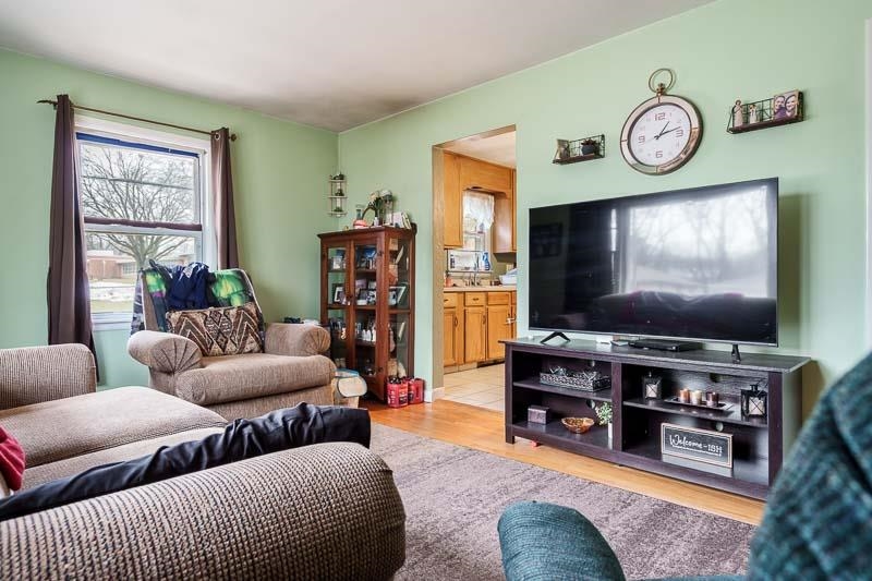 3715 Rural Street Rockford, IL 61107 - Photo 21 of 35 a living room with furniture and a flat screen tv