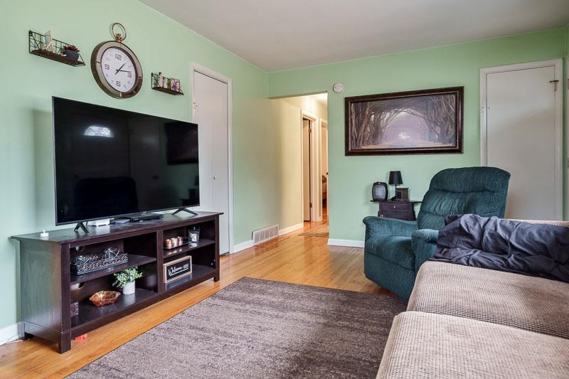 3715 Rural Street Rockford, IL 61107 - Photo 22 of 35 a living room with furniture and a flat screen tv