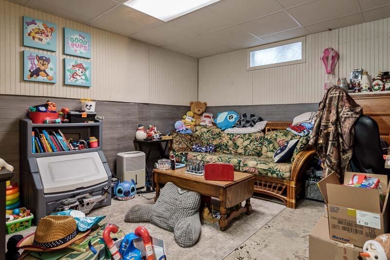 3715 Rural Street Rockford, IL 61107 - Photo 30 of 35 a room with furniture and a flat screen tv