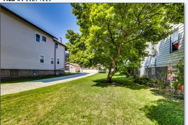 a house view with a garden space