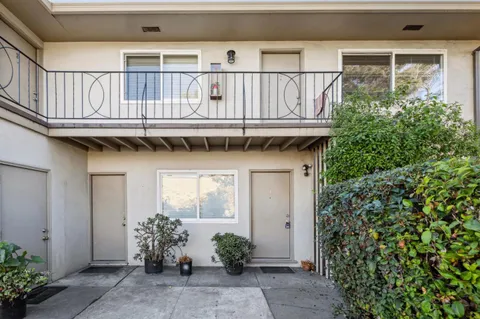 a view of a house with a flower plants