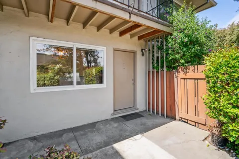a front view of a house with a garage