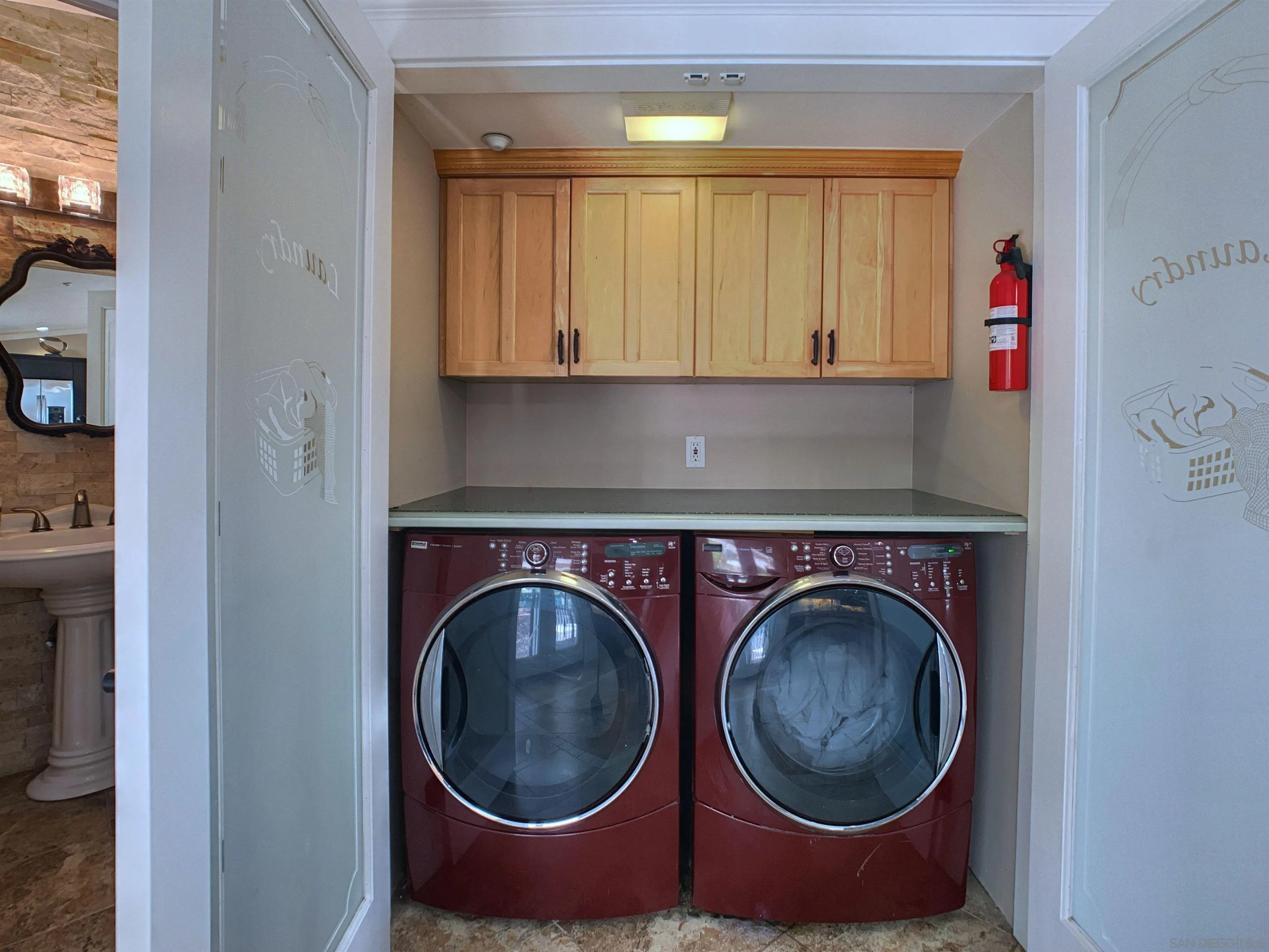 205 Highline Trail El Cajon, CA 92021 - Photo 16 of 45 a utility room with dryer and washer