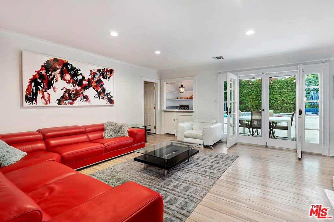 3389 Wrightview Place Studio City, CA 91604 - Photo 7 of 20 a living room with furniture and a large window