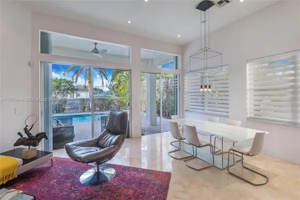 a lobby with furniture and window