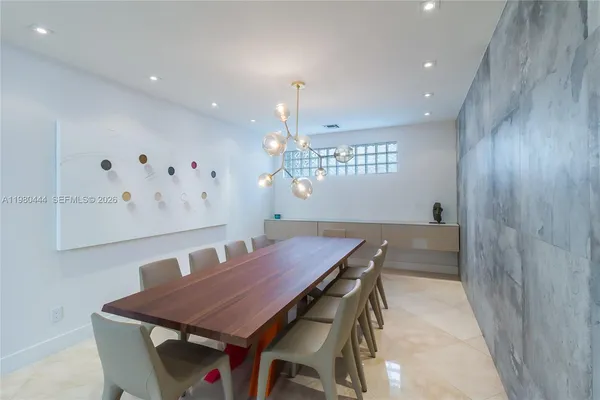 a view of a dining room with furniture