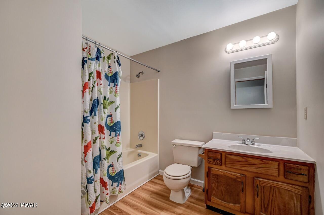 19 Ripple Lane Beach Lake, PA 18405 - Photo 39 of 52 a bathroom with a sink toilet and vanity