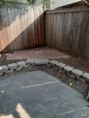 view of outdoor space with wooden fence