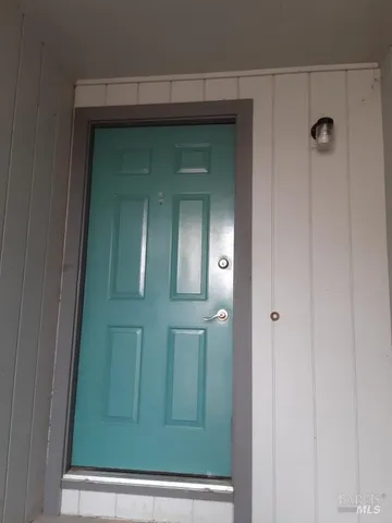 a view of empty room with windows