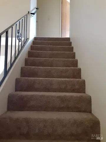 a living room with a fireplace