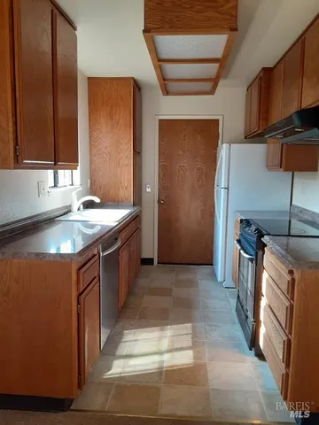 a bathroom with a sink and a window