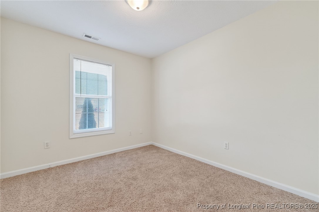 240 Rock Harbor Lane Spring Lake, NC 28390 - Photo 17 of 35 an empty room with a window