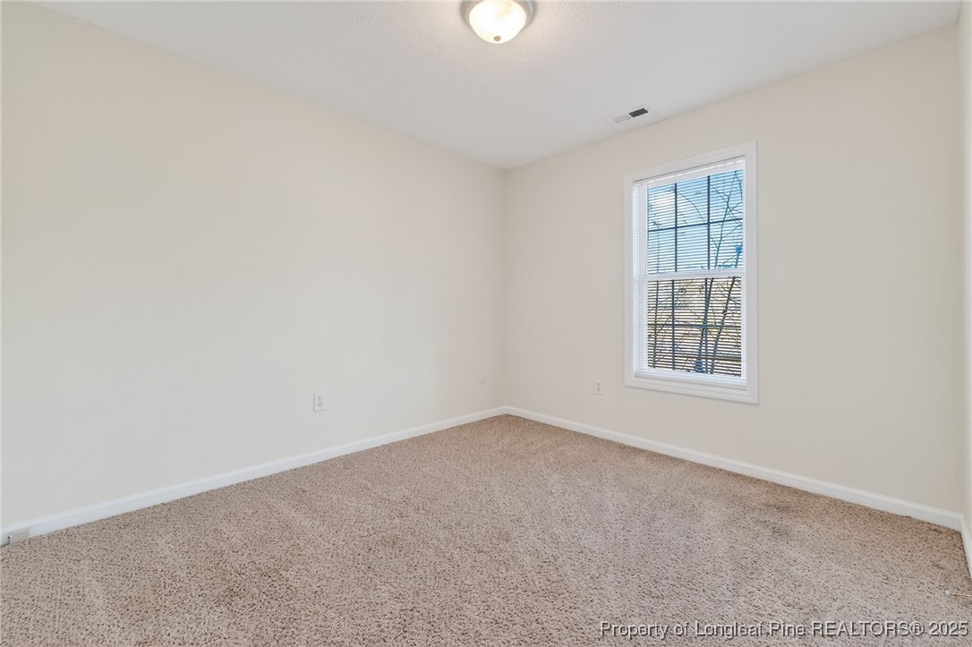 240 Rock Harbor Lane Spring Lake, NC 28390 - Photo 19 of 35 an empty room with windows