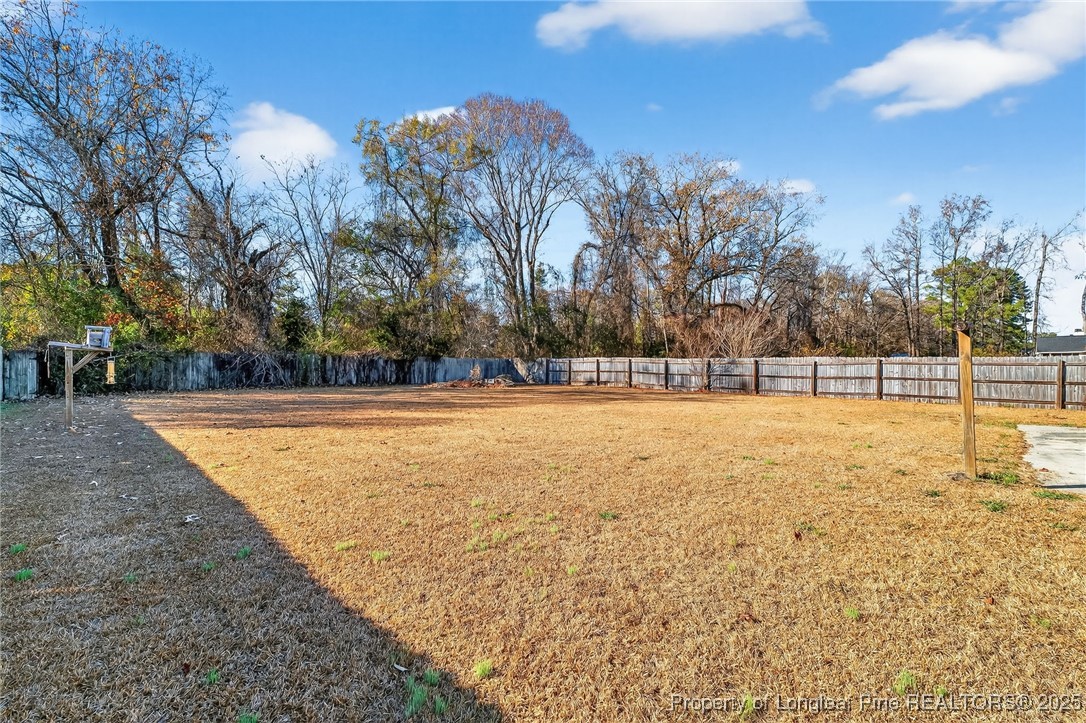 240 Rock Harbor Lane Spring Lake, NC 28390 - Photo 28 of 35 a view of yard with trees