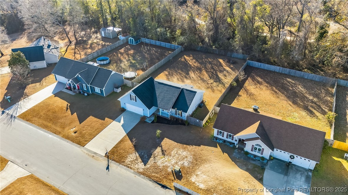 240 Rock Harbor Lane Spring Lake, NC 28390 - Photo 33 of 35 aerial view of a house with swimming pool