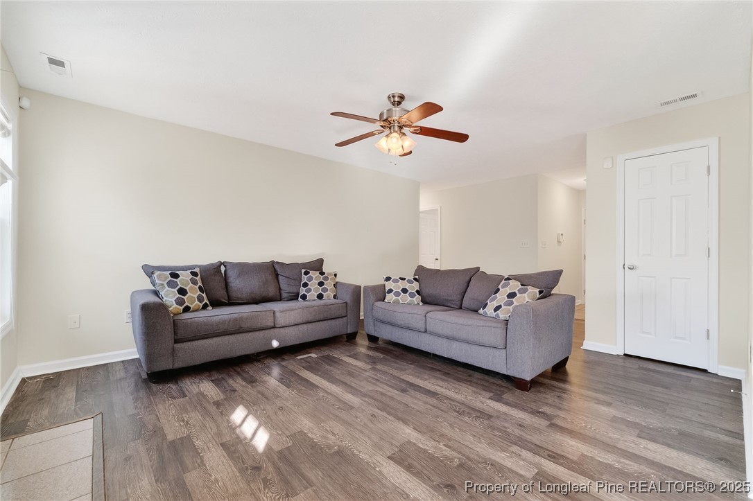 240 Rock Harbor Lane Spring Lake, NC 28390 - Photo 8 of 35 a living room with couches and a coffee table