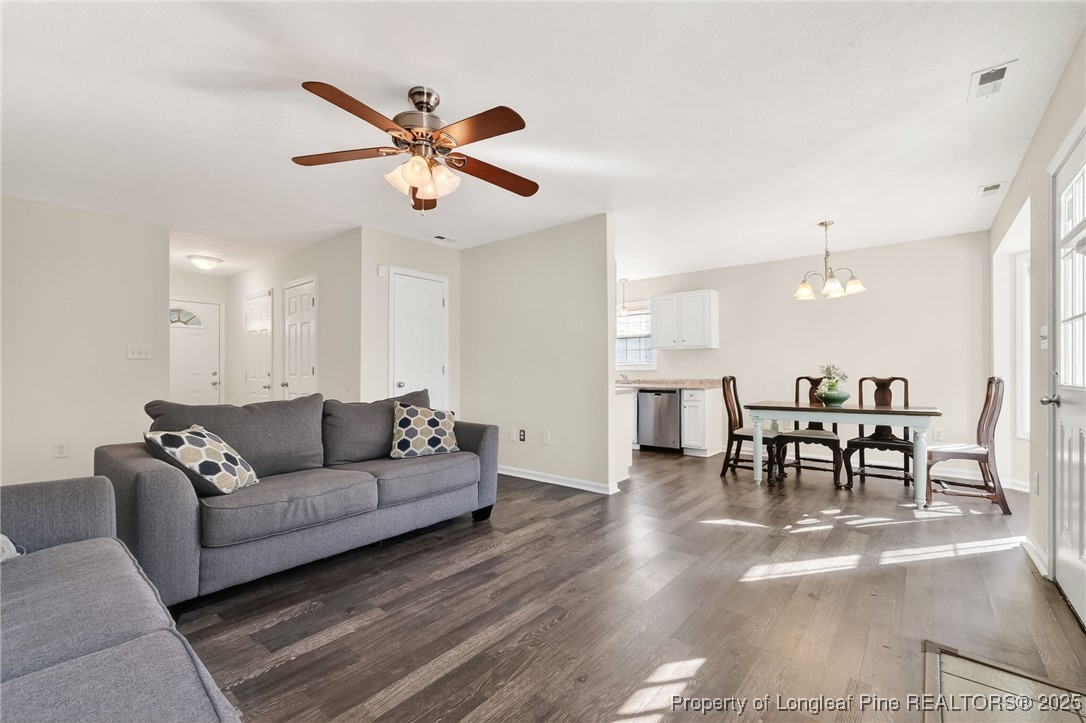 240 Rock Harbor Lane Spring Lake, NC 28390 - Photo 9 of 35 a living room with furniture and kitchen view