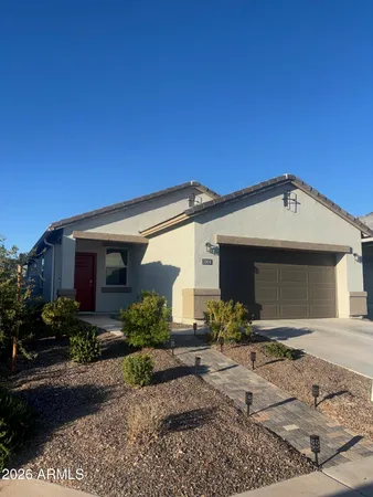 a view of a house with yard