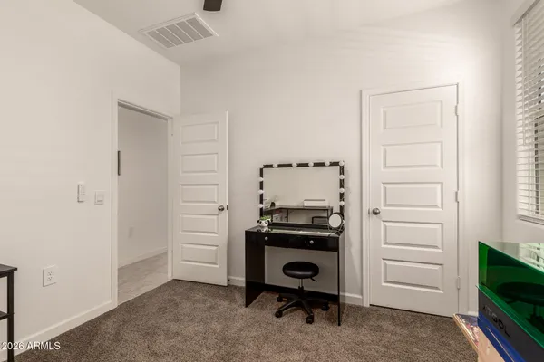 a view of a livingroom with a flat screen tv