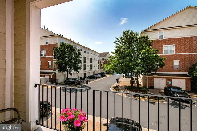 a view of street from balcony