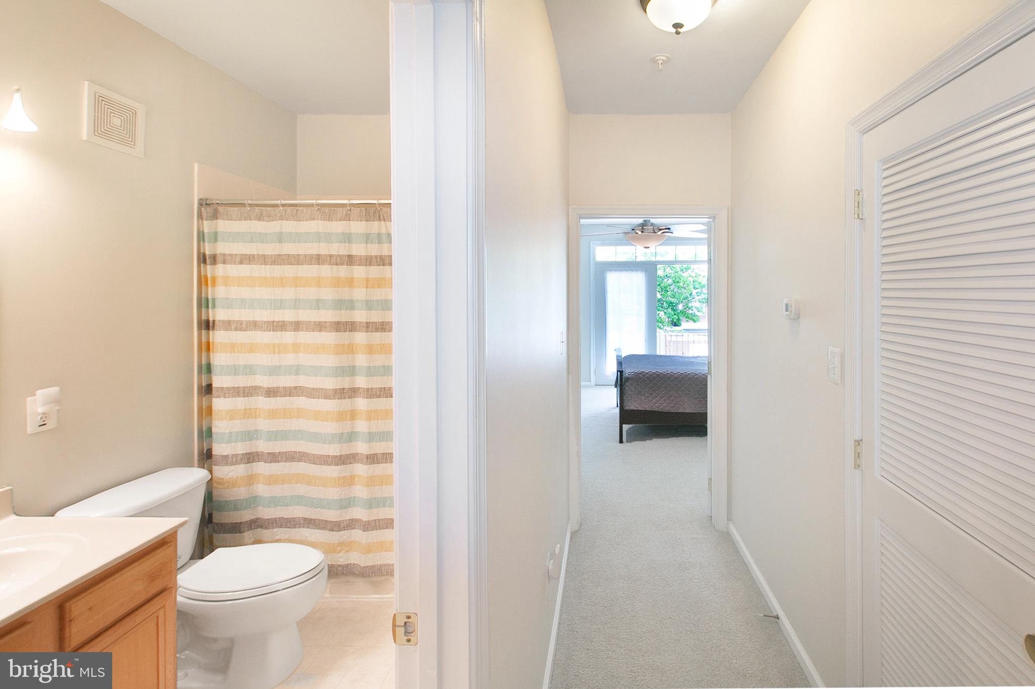 12426 Liberty Bridge Road Fairfax, VA 22033 - Photo 25 of 28 a bathroom with a toilet