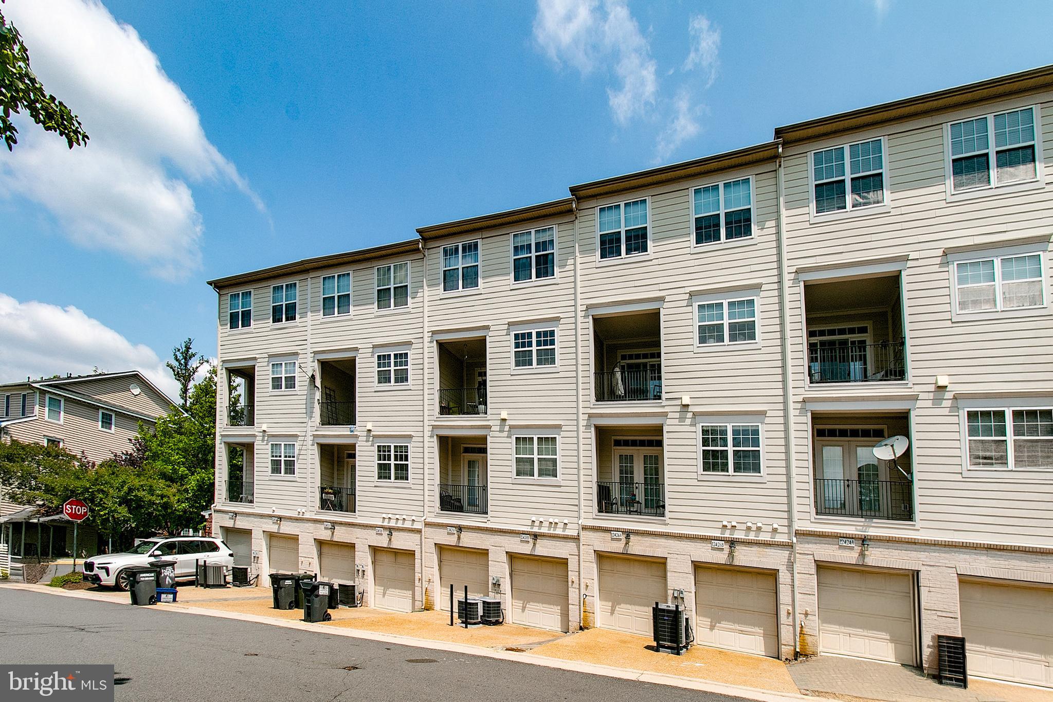 12426 Liberty Bridge Road Fairfax, VA 22033 - Photo 28 of 28 a front view of a building with street view