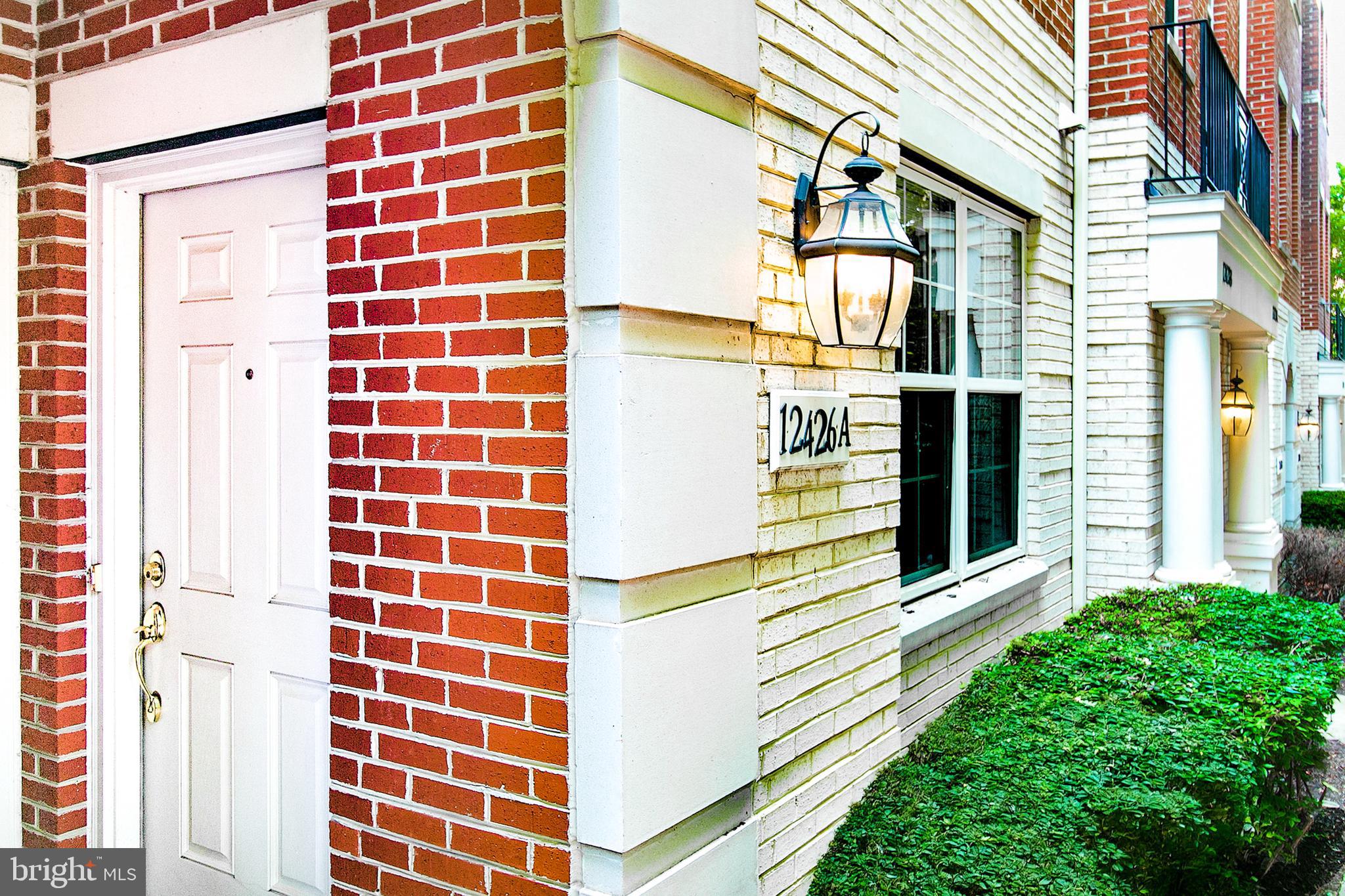 12426 Liberty Bridge Road Fairfax, VA 22033 - Photo 3 of 28 a view of a brick wall