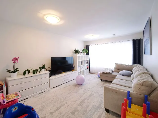 a living room with furniture and a couch