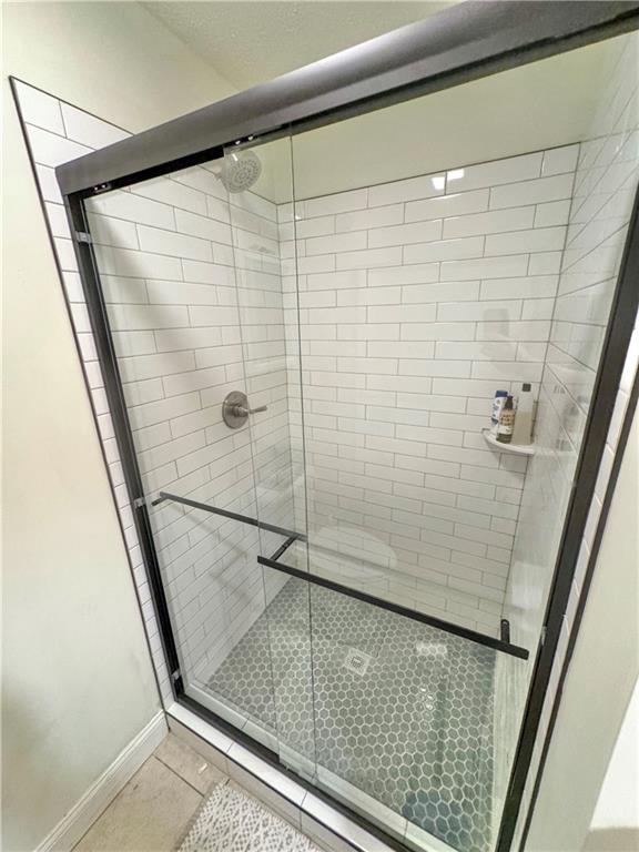 3905 Hunt Drive Gainesville, GA 30507 - Photo 15 of 16 a bathroom with a shower