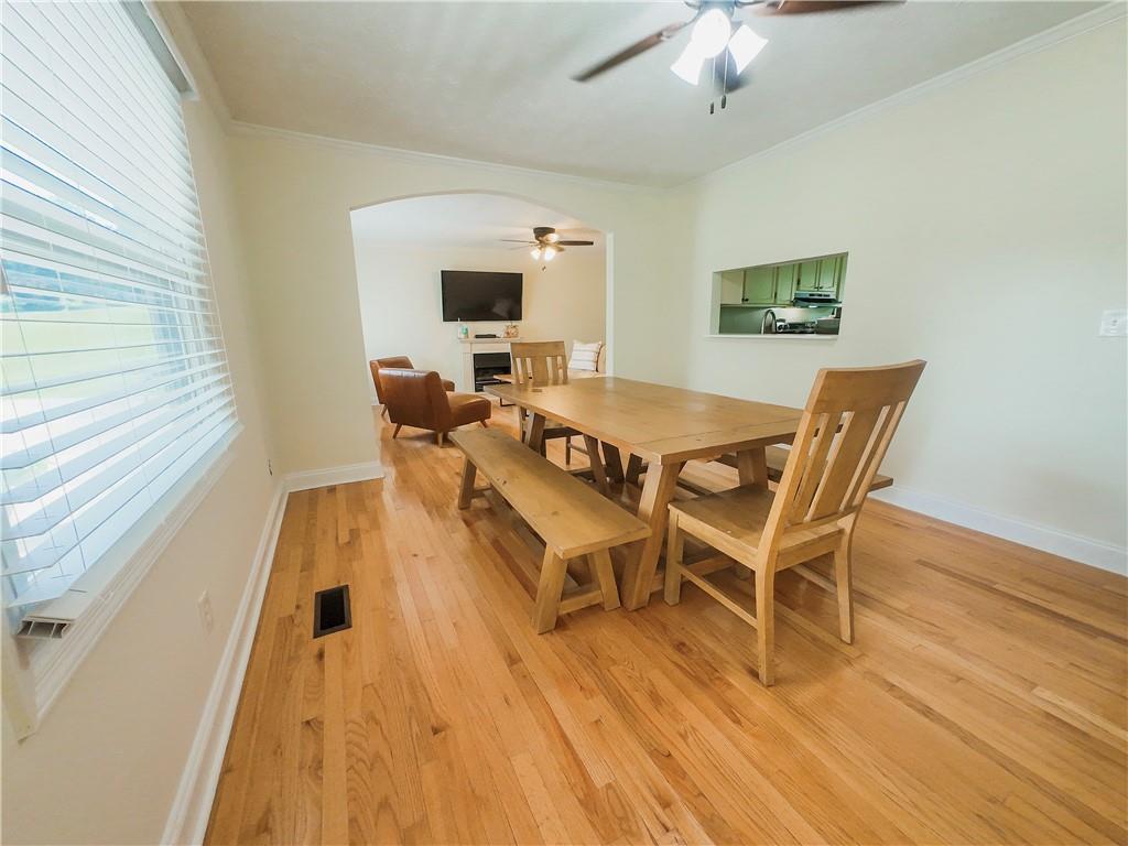 3905 Hunt Drive Gainesville, GA 30507 - Photo 4 of 16 a dining room with furniture and wooden floor