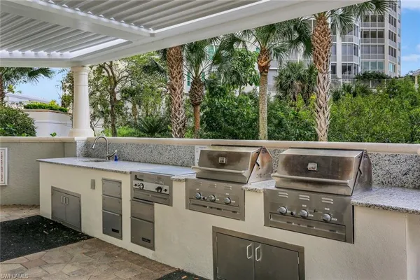 a kitchen with a stove and a microwave