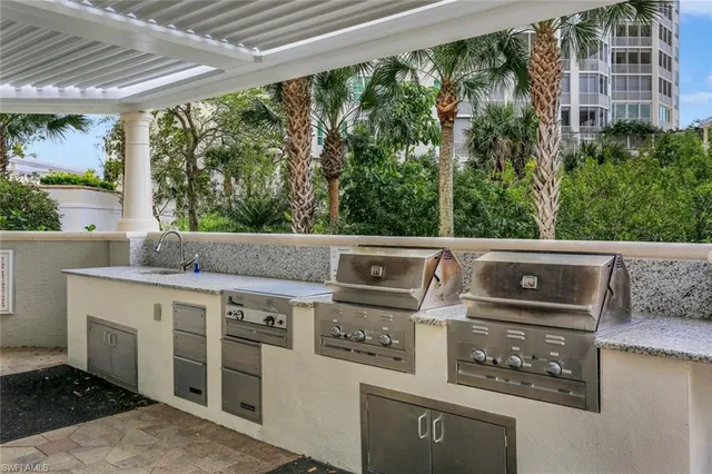 a kitchen with a stove and a microwave