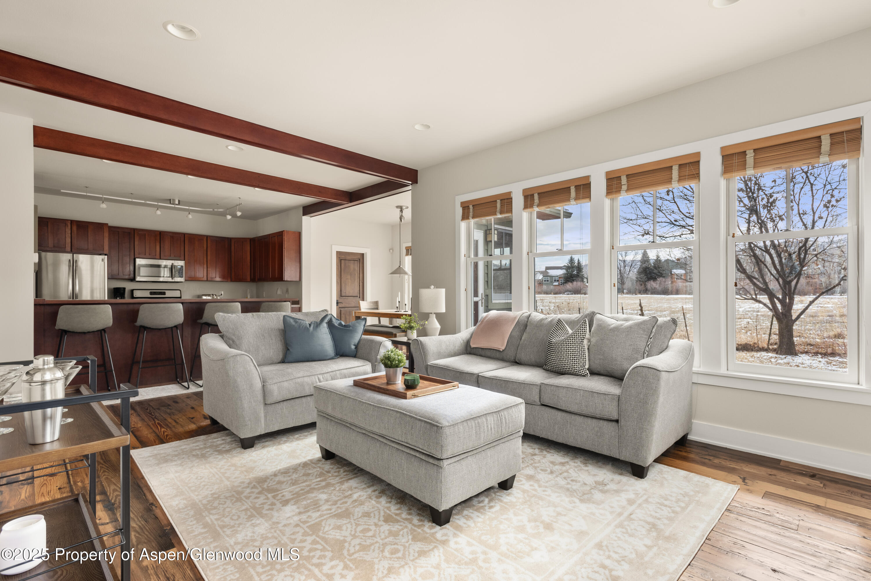 314 Sopris Circle Basalt, CO 81621 - Photo 13 of 36 a living room with furniture and a large window