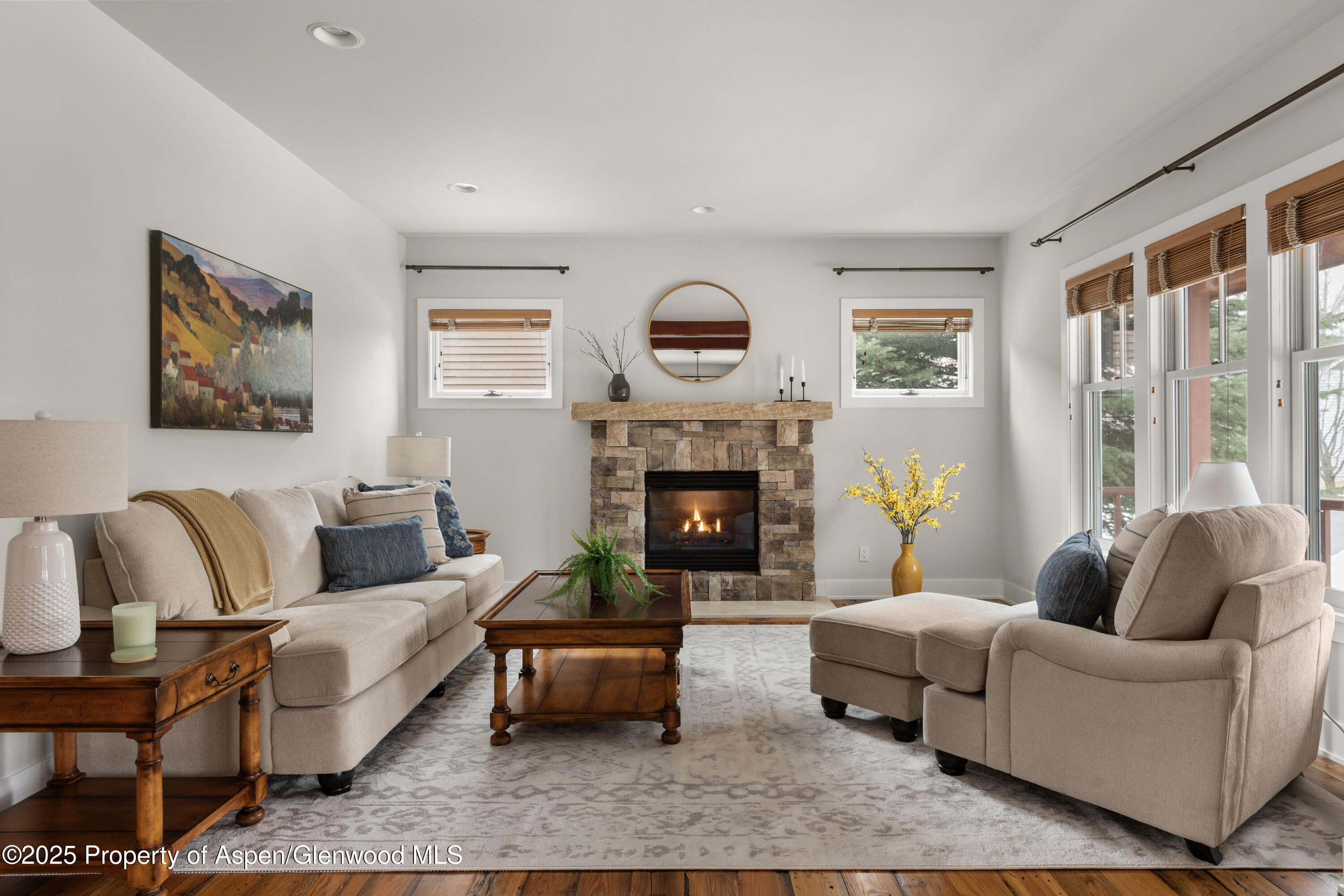 314 Sopris Circle Basalt, CO 81621 - Photo 2 of 36 a living room with furniture and a fireplace