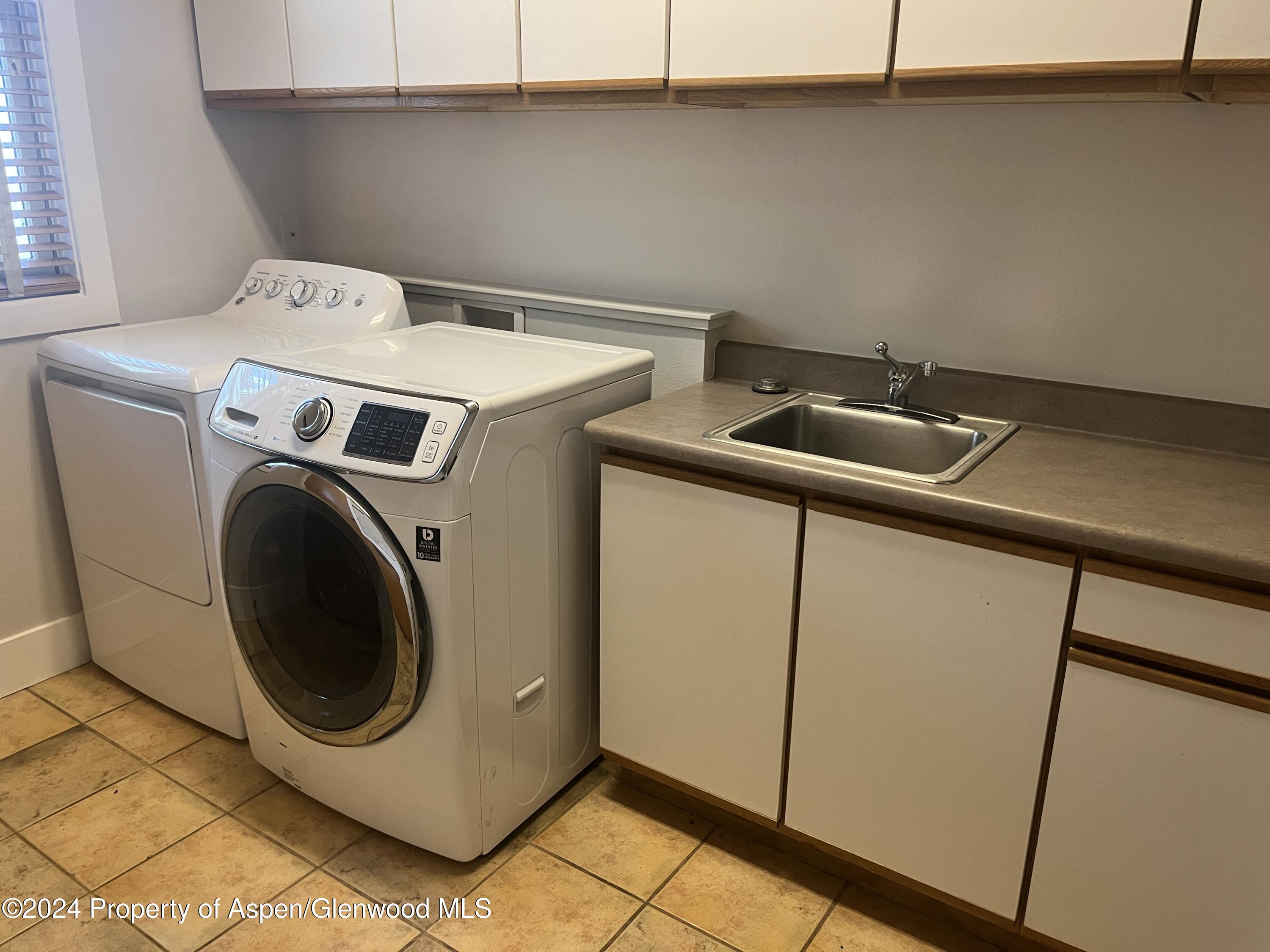 314 Sopris Circle Basalt, CO 81621 - Photo 24 of 36 a utility room with dryer and washer