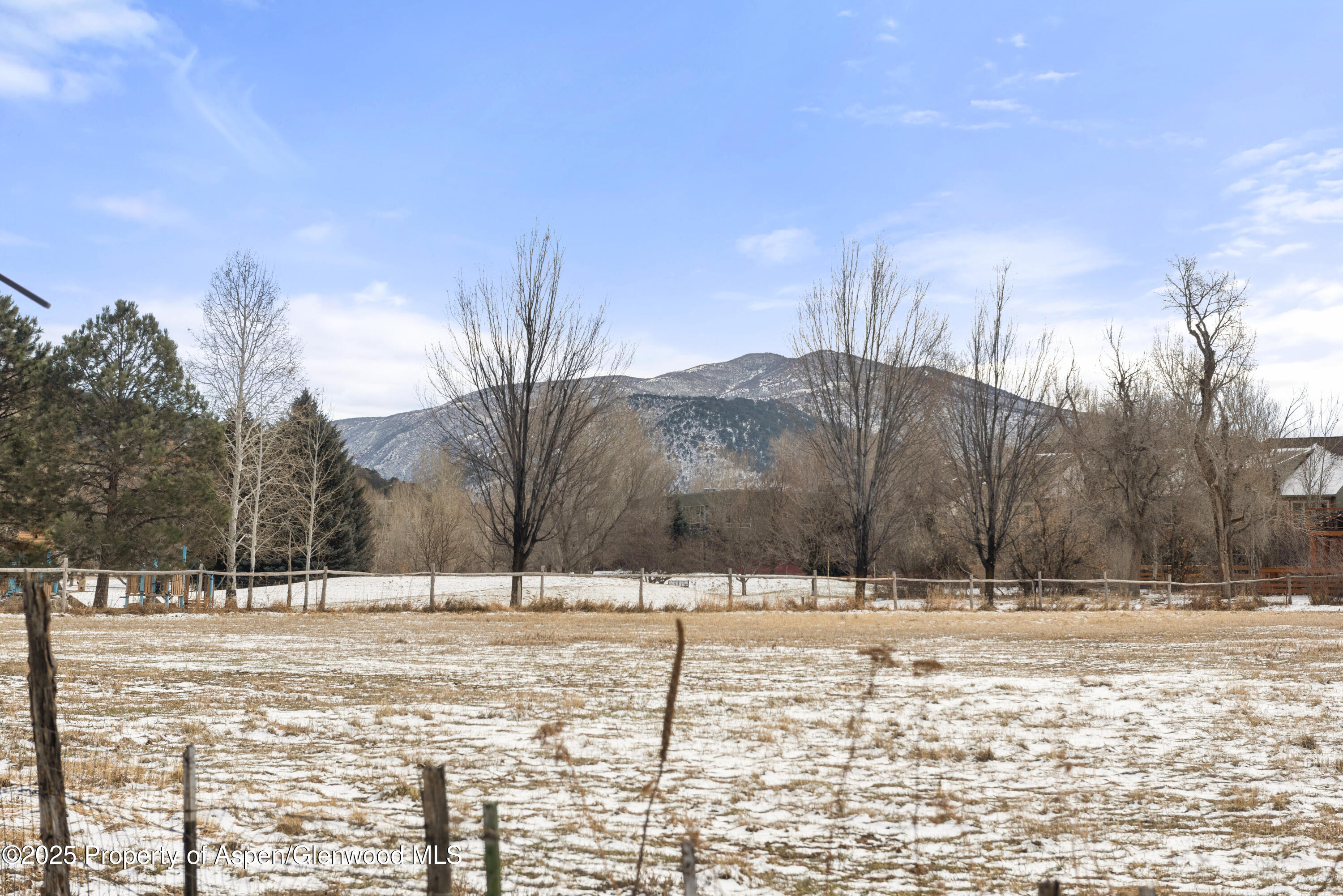 314 Sopris Circle Basalt, CO 81621 - Photo 33 of 36 a street view covered with snow
