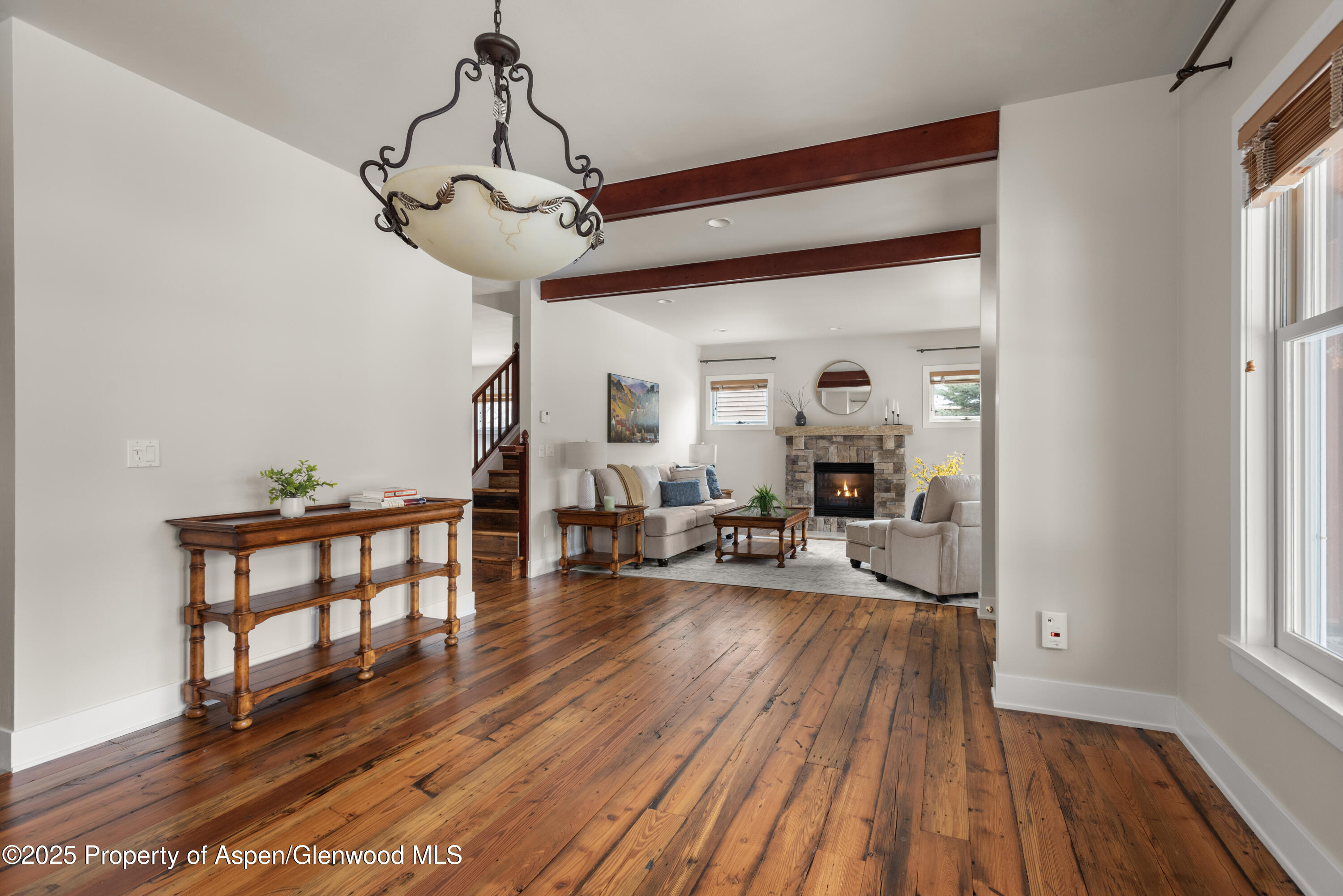 314 Sopris Circle Basalt, CO 81621 - Photo 4 of 36 a very nice looking living room with wooden floor and furniture