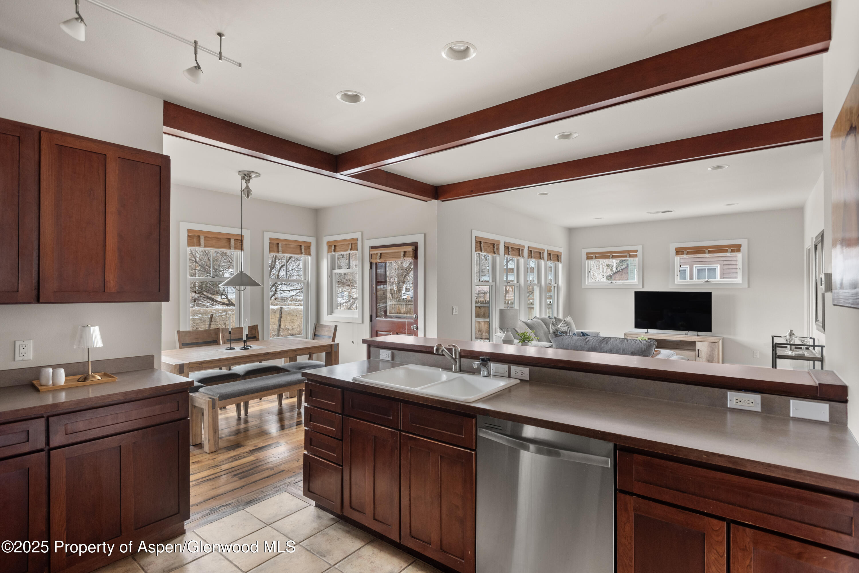 314 Sopris Circle Basalt, CO 81621 - Photo 6 of 36 a kitchen with a sink stove and cabinets