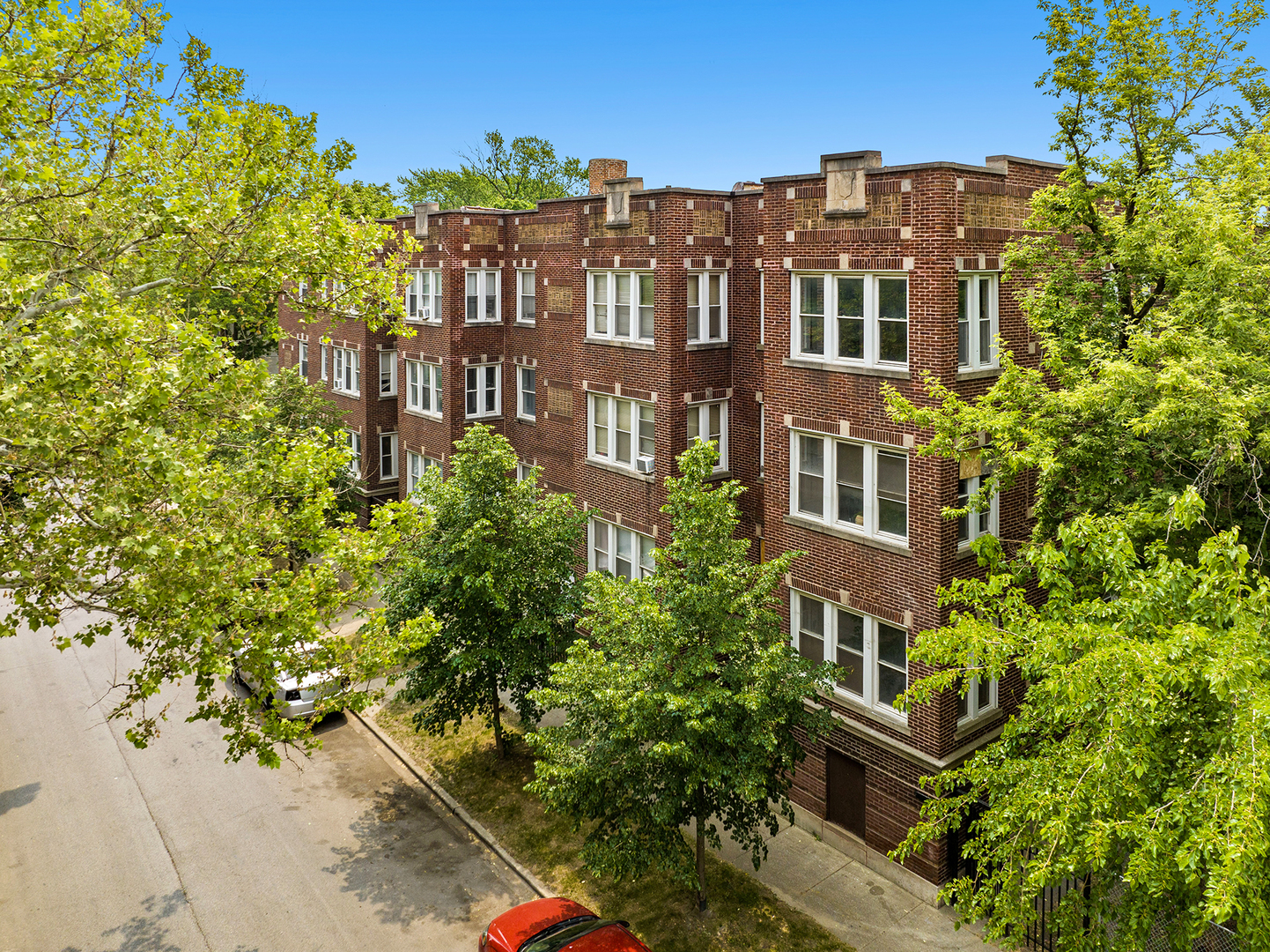 2437 East 74th Street, Unit 3W Chicago, IL 60649 - Photo 2 of 18 a view of a building