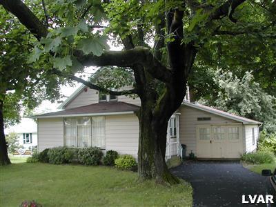 1067 State Park Road Wind Gap, PA 18091 - Photo 5 of 9 a view of a house with a yard