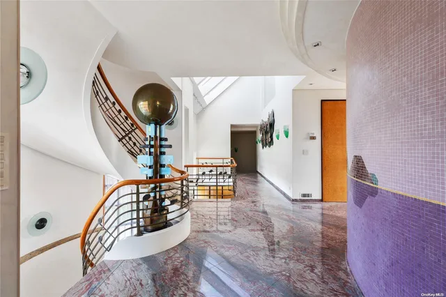 a view of entryway livingroom and hall