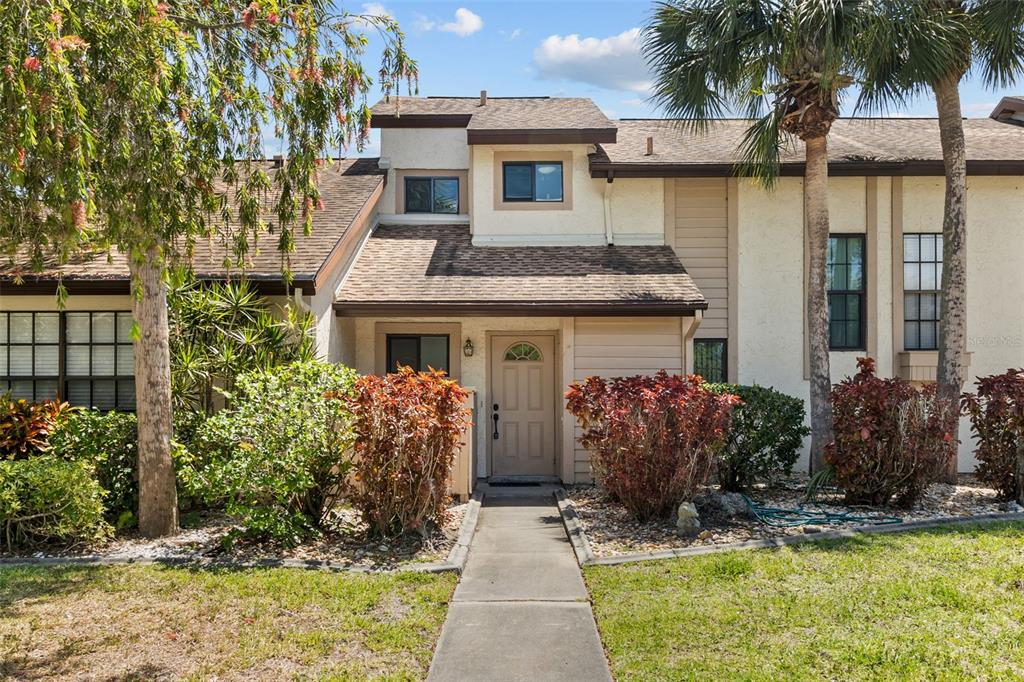 a front view of house with yard