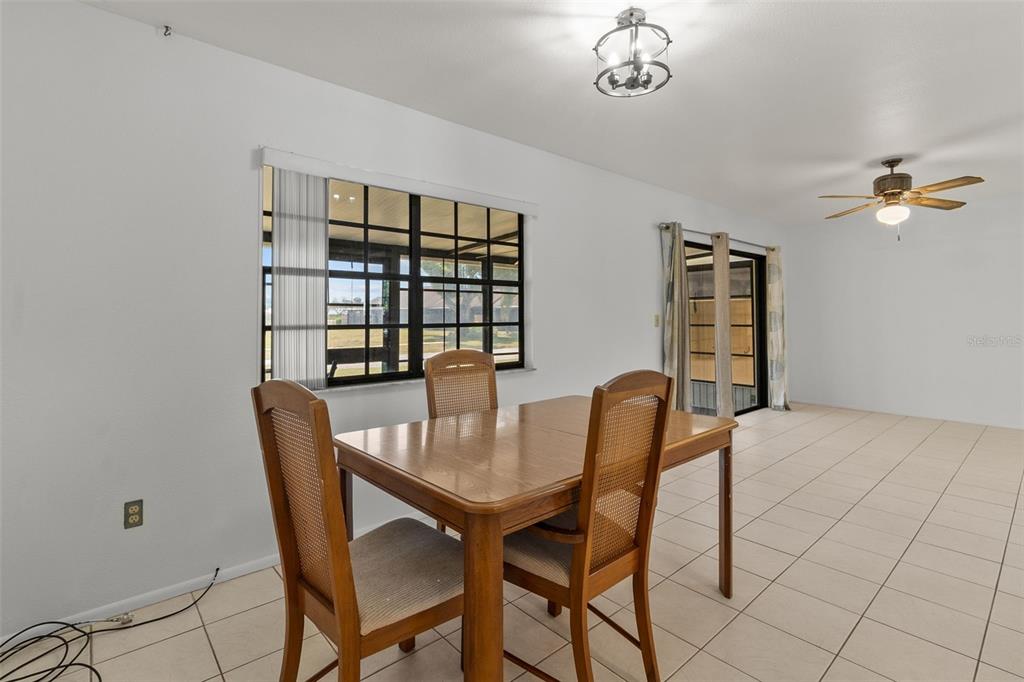 5628 Linksman Place North Port, FL 34287 - Photo 14 of 33 a dining room with furniture and window