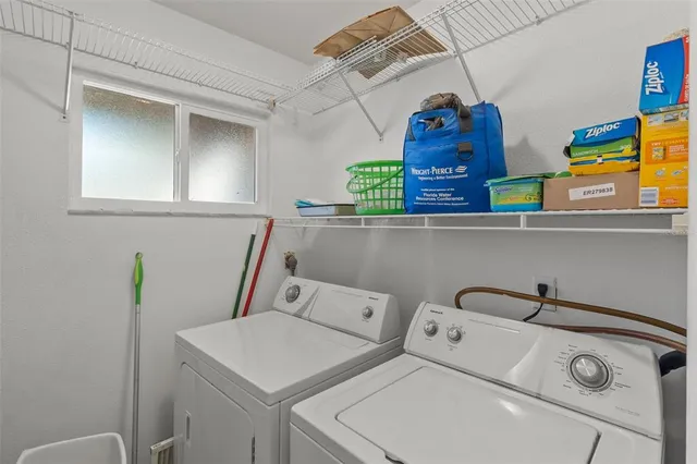 a utility room with dryer and washer