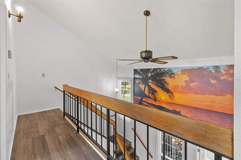 5628 Linksman Place North Port, FL 34287 - Photo 23 of 33 a view of a hallway with chandelier