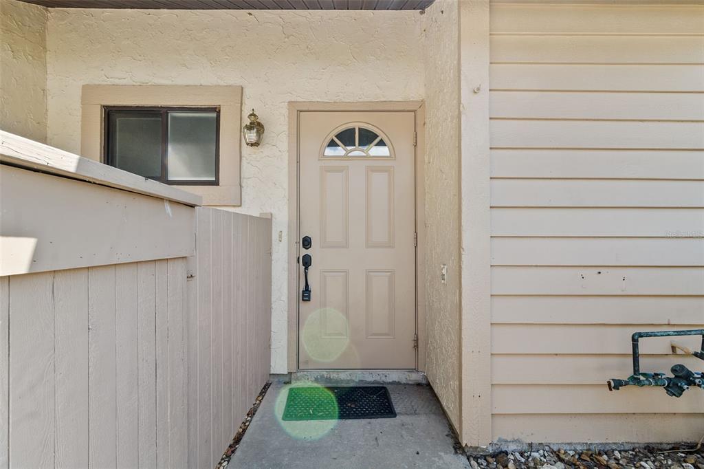 5628 Linksman Place North Port, FL 34287 - Photo 3 of 33 a view of a hallway to rooms