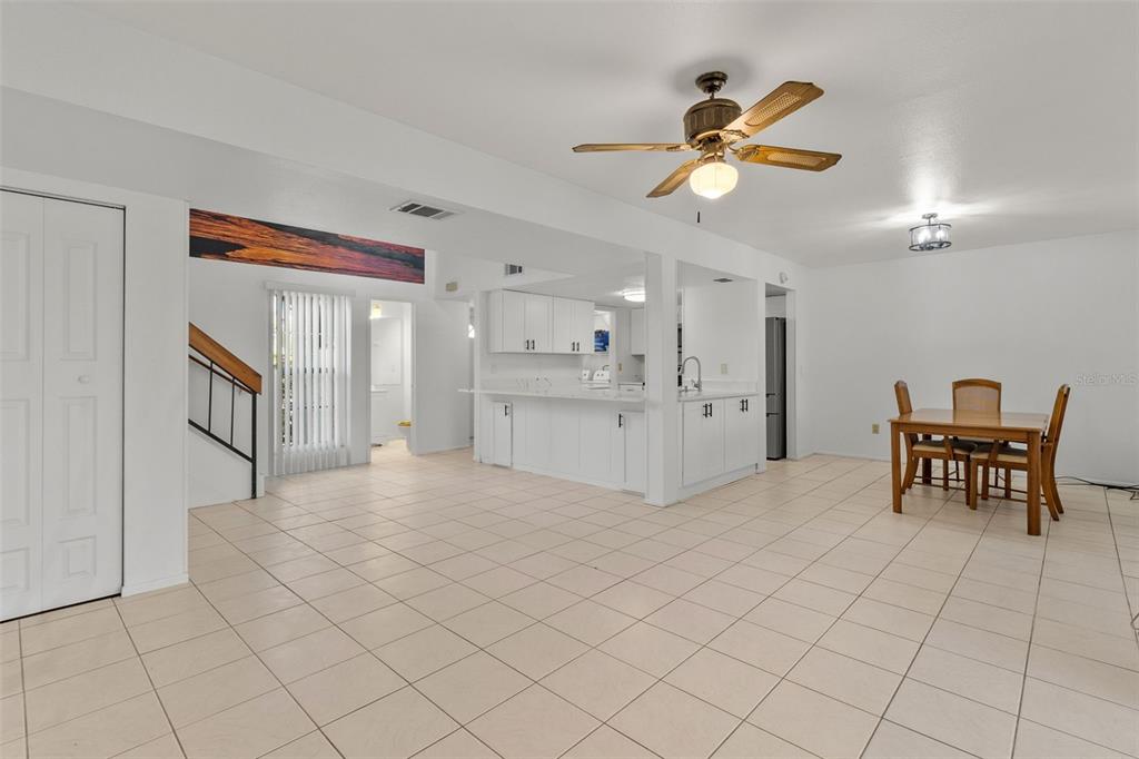 5628 Linksman Place North Port, FL 34287 - Photo 10 of 33 a view of a livingroom with furniture and chandelier fan